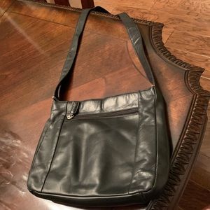The Sak Black Pure Leather Crossbody Purse.